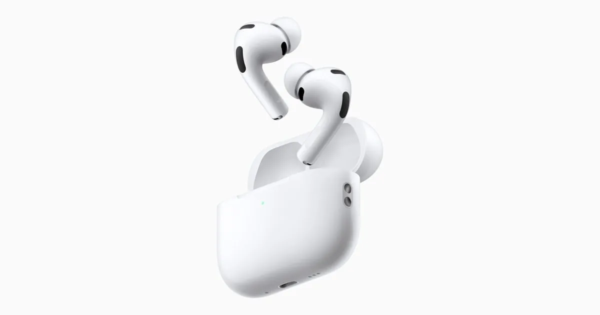 Apple AirPods Pro 3 earbuds lifting out of their open charging case.